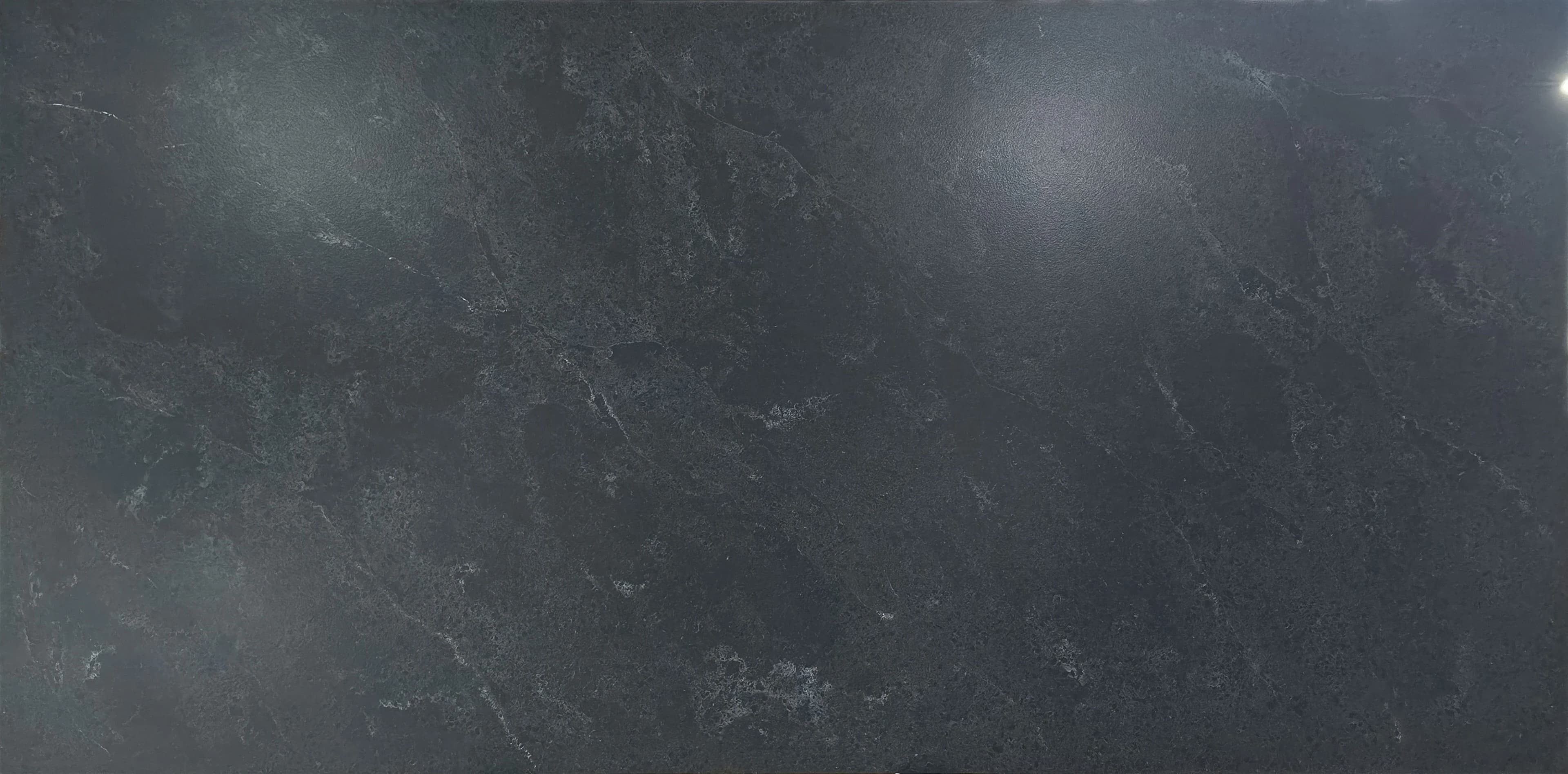 Moe Black Leather slab by Lucent Quartz